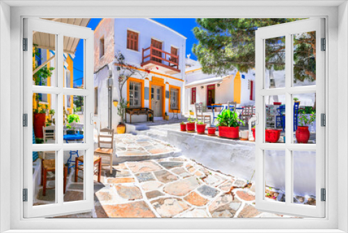 Fototapeta Naklejka Na Ścianę Okno 3D - Beautiful Lefkes traditional greek village in Paros island. Charming coffe bars and taverns in colorful narrow streets. Cyclades , Greece