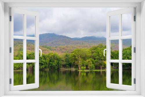 Fototapeta Naklejka Na Ścianę Okno 3D - landscape lake views at Ang Kaew Chiang Mai University in nature forest Mountain views spring cloudy sky background with white cloud.