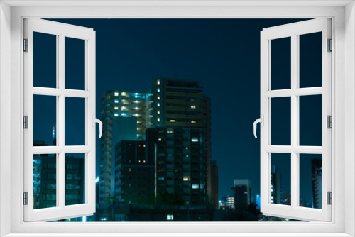 Fototapeta Naklejka Na Ścianę Okno 3D - 都会の高層マンションとビル群の夜景
