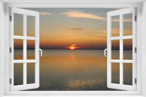 Fototapeta Naklejka Na Ścianę Okno 3D - Wadden Sea: Sunset over Langeoog Island with rising tide