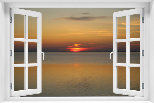 Fototapeta Naklejka Na Ścianę Okno 3D - Wadden Sea: the sunset over the island of Langeoog - a play of colors