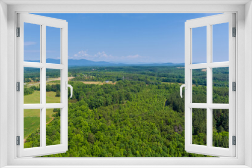 Fototapeta Naklejka Na Ścianę Okno 3D - Aerial on green forest view at summer time with good weather by mountains in Campobello town , South Carolina