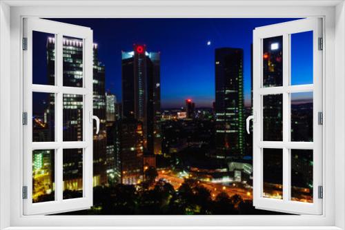 Fototapeta Naklejka Na Ścianę Okno 3D - From the window at night in the Frankfurt skyline