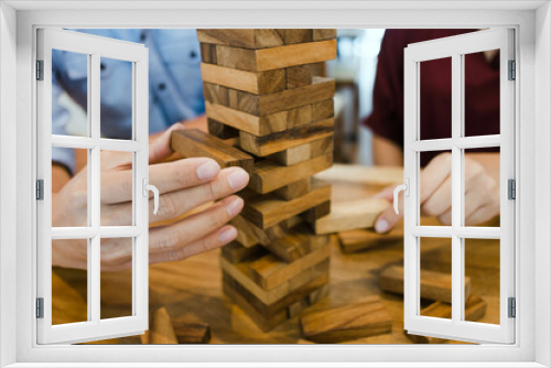 Fototapeta Naklejka Na Ścianę Okno 3D - Man hand arranging wood block stacking.Business planning development