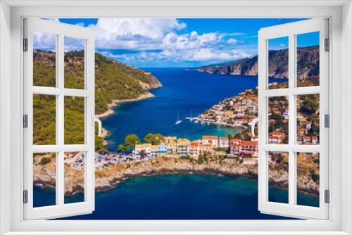 Fototapeta Naklejka Na Ścianę Okno 3D - Aerial drone view video of beautiful and picturesque colorful traditional fishing village of Assos in island of Cefalonia, Ionian, Greece. Peninsula of Assos in Cephalonia (Kefalonia), Greece