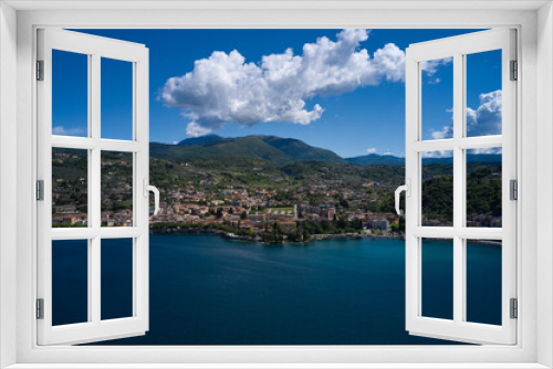 Fototapeta Naklejka Na Ścianę Okno 3D - Aerial view of the city of Garda, Lake Garda, Italy. Panorama on corno. Top view of the Museum of Lake Garda on the coastline. Vista lago on the coastline.