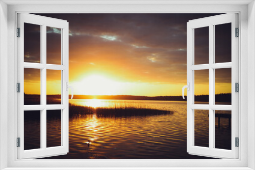 Fototapeta Naklejka Na Ścianę Okno 3D - Yellow sunset on the lake. Blurred natural background, Sunset sky over lake