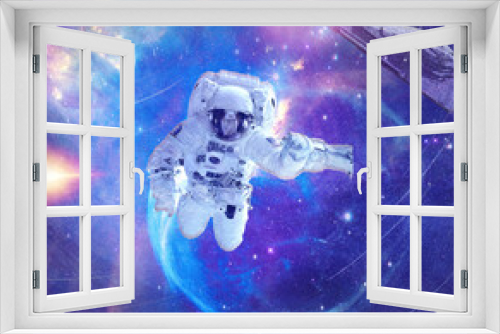 Fototapeta Naklejka Na Ścianę Okno 3D - Astronauta perdido na imensidão do espaço.