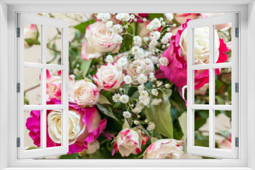 Fototapeta Naklejka Na Ścianę Okno 3D - Bicolor variety of roses in a bouquet. White petals in the heart of the inflorescence are surrounded by red petals at the edges. View from above
