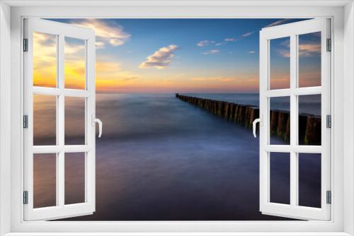 Fototapeta Naklejka Na Ścianę Okno 3D - Traumhafte Meereslandschaft im Sonnenuntergang als Langzeitbelichtung