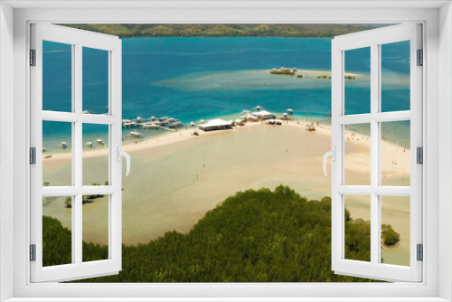 Fototapeta Naklejka Na Ścianę Okno 3D - Luli island and sandy beach with tourists, sand bar surrounded by coral reef and blue sea in the honda bay, aerial drone. Tropical island and coral reef. Summer and travel vacation concept