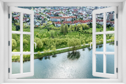 Fototapeta Naklejka Na Ścianę Okno 3D - aerial view of summer cityscape with residential houses, green park and beautiful river