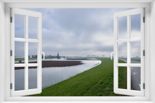 Fototapeta Naklejka Na Ścianę Okno 3D - Rivier De Lek gezien vanaf de Lekbandijk bij Ravenswaaij