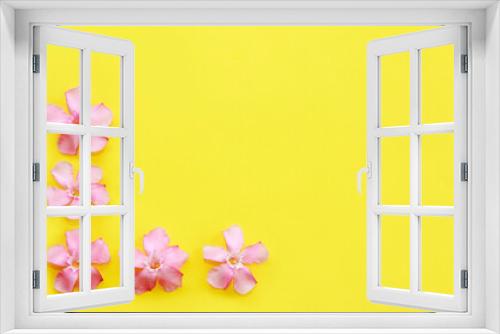Fototapeta Naklejka Na Ścianę Okno 3D - small pink oleander flowers on a yellow background