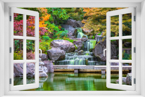 Fototapeta Naklejka Na Ścianę Okno 3D - Long exposure, waterfall in Kyoto garden in Holland park in London, England