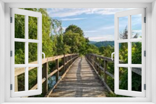 Fototapeta Naklejka Na Ścianę Okno 3D - wooden bridge over river