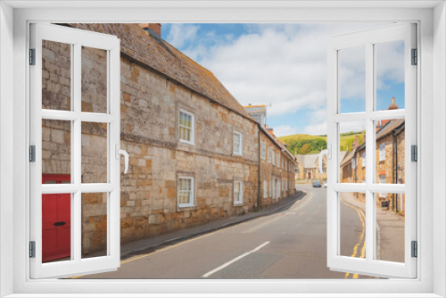 Fototapeta Naklejka Na Ścianę Okno 3D - Picturesque old town of the quaint and charming English village of Abbotsbury, Dorset, England, UK on a sunny summer day.