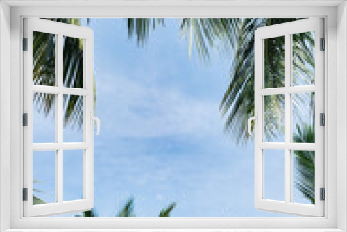 Fototapeta Naklejka Na Ścianę Okno 3D - palm trees on blue sky