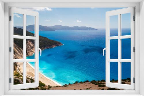 Fototapeta Naklejka Na Ścianę Okno 3D - A top view at Myrtos Beach and fantastic azure Ionian Sea water. Aerial view, summer scenery of famous and extremely popular travel destination in Cephalonia, Greece, Europe.