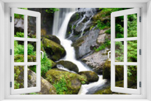Fototapeta Naklejka Na Ścianę Okno 3D - Beautiful smooth water waterfall in green forest
