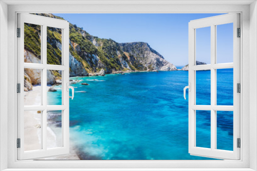 Fototapeta Naklejka Na Ścianę Okno 3D - Aerial view Agia Eleni beach in Kefalonia Island, Greece. Remote beautiful rocky beach with clear emerald water and high white cliffs