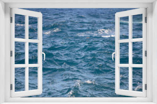 Fototapeta Naklejka Na Ścianę Okno 3D - Tropical blue ocean in Hawaii. Summer sea in clean and clear water from surface for background. Waves concept design.