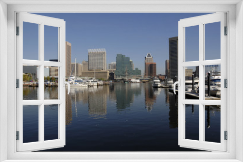 Fototapeta Naklejka Na Ścianę Okno 3D - Baltimore skyline reflected in the Inner Harbor
