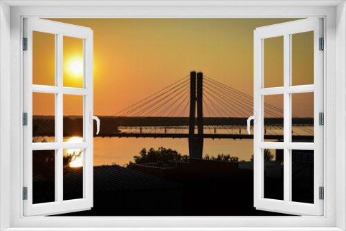 Fototapeta Naklejka Na Ścianę Okno 3D - Bridge across the river at sunset