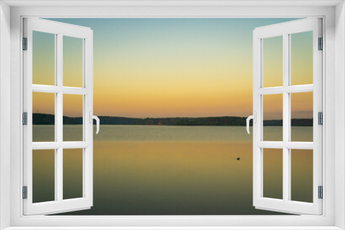 Fototapeta Naklejka Na Ścianę Okno 3D - Calm beautiful sunrise over the lake with sky reflection in water