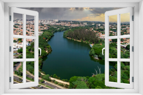 Fototapeta Naklejka Na Ścianę Okno 3D - Aerial drone images from the Taquaral park in Campinas, São Paulo. With a view to Cambuí.