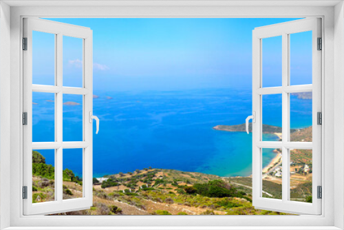 Fototapeta Naklejka Na Ścianę Okno 3D - Panoramic view of Agios Petros beach and Gavrio bay on Andros, famous Cycladic island, in the heart of the Aegean Sea