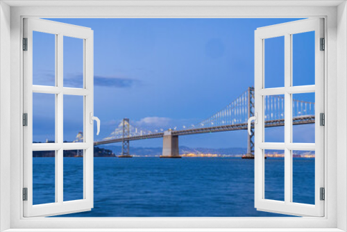 Fototapeta Naklejka Na Ścianę Okno 3D - Twilight view of The San Francisco Oakland Bay Bridge