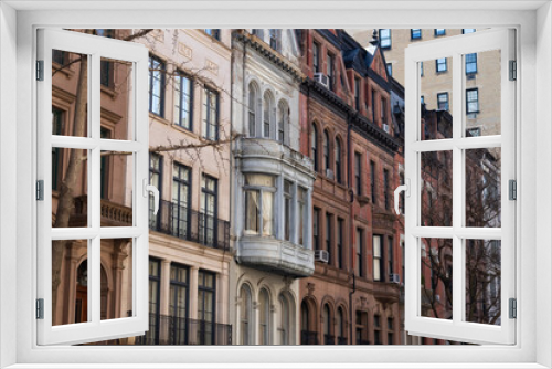 Fototapeta Naklejka Na Ścianę Okno 3D - Row of Colorful Old Brownstone Homes and Residential Buildings on the Upper East Side of New York City