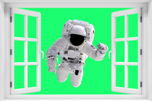 Fototapeta Naklejka Na Ścianę Okno 3D - Astronaut on green screen background- Elements of this Image Furnished by NASA