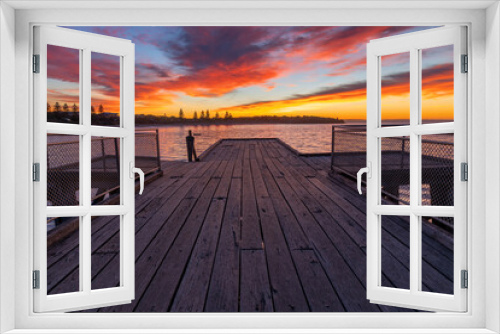 Fototapeta Naklejka Na Ścianę Okno 3D - Sunrise over the iconic Port Elliot jetty located on the Fleurieu Peninsula South Australia taken on May 31st 2021