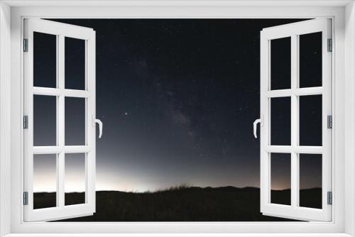Fototapeta Naklejka Na Ścianę Okno 3D - Milky Way over Distant Mountains