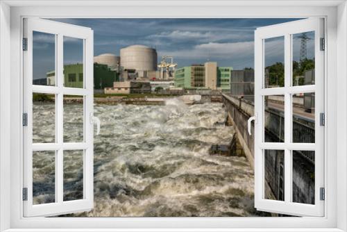 Fototapeta Naklejka Na Ścianę Okno 3D - Hydropower plant with full capacity in floods