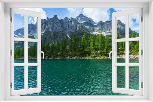 Fototapeta Naklejka Na Ścianę Okno 3D - The black lake( Lago Nero ): a beautiful alpine lake located within the Alpe veglia - Devero natural park, near the town of Baceno, Italy - July 2021.