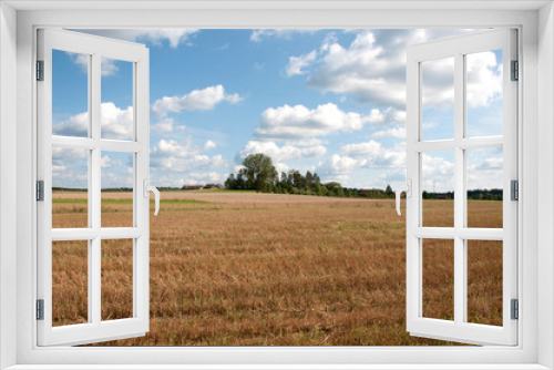 Fototapeta Naklejka Na Ścianę Okno 3D - chmury nad polami