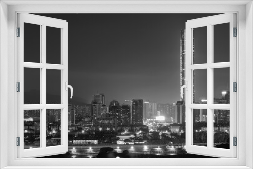 Fototapeta Naklejka Na Ścianę Okno 3D - Skyline of Shenzhen city, China at night. Viewed from Hong Kong border