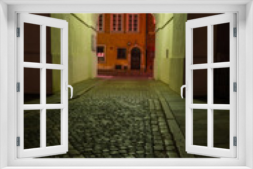 Fototapeta Naklejka Na Ścianę Okno 3D - Empty Cobbled Street In City By Night