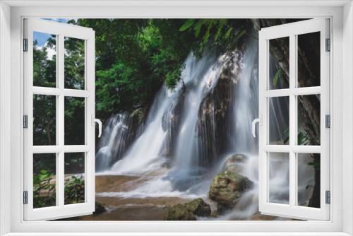 Fototapeta Naklejka Na Ścianę Okno 3D - Scenic waterfall in lush rainforest. Sai Yok Noi Waterfall, Kanchanaburi, Thailand