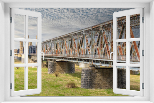 Fototapeta Naklejka Na Ścianę Okno 3D - Tczew, Poland - built in 1851 and destroyed several times during WWII, the bridges on the Vistula River are the main landmark in Tczew and among the most famous bridges in Poland