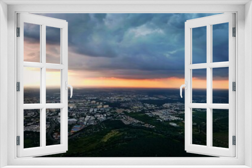 Fototapeta Naklejka Na Ścianę Okno 3D - sunset over the city