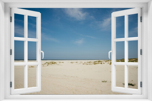 Fototapeta Naklejka Na Ścianę Okno 3D - Wide beach landscape with sand dunes and blue sky, North Sea
