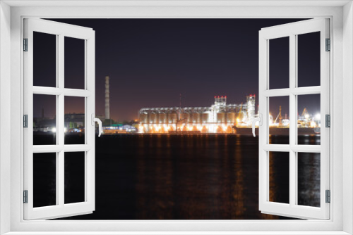 Fototapeta Naklejka Na Ścianę Okno 3D - View of illuminated harbor at night