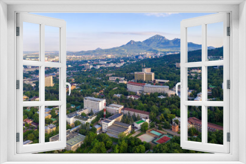 Aerial view of Pyatigorsk and Beshtau mount on sunny day. Stavropol Krai, Russia.