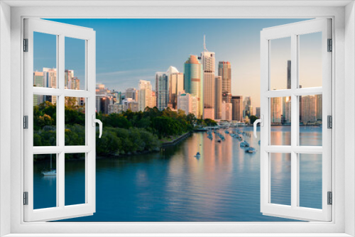 Brisbane city buildings and river seen in early morning light from Kangaroo Point. Brisbane is the state capital of Queensland, Australia.