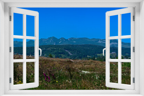 Fototapeta Naklejka Na Ścianę Okno 3D - Panoramic view of the Sancy Puys Chain in summer. Auvergne, France