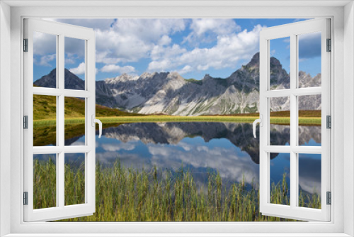 Fototapeta Naklejka Na Ścianę Okno 3D - Bergsee in den Alpen